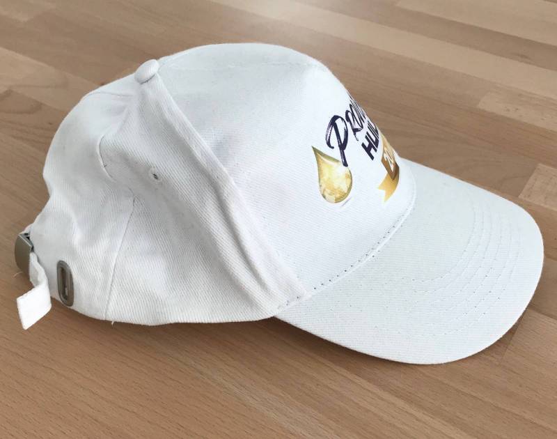 Casquette publicitaire blanche avec marquage transfert pour Entreprise professionnelle à Cannes 83